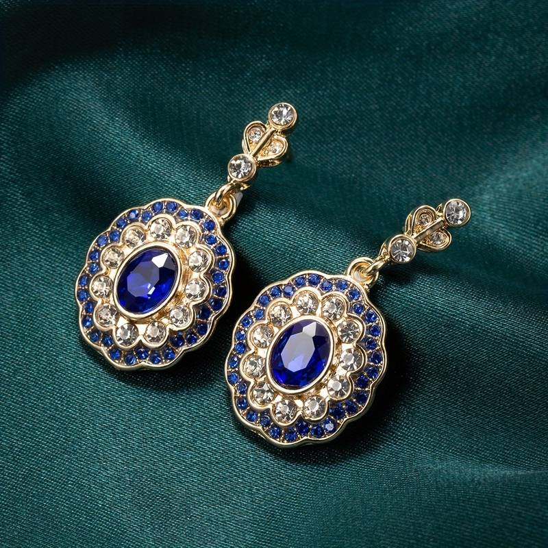 Vintage Goldohrringe mit blauem Mandala-Kristall