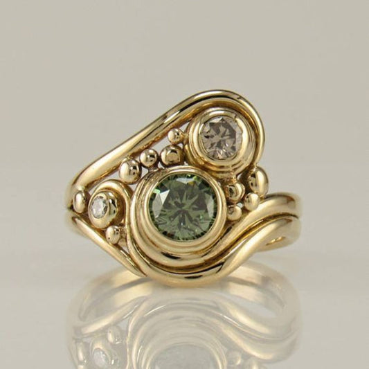 Vintage Goldring mit grünlichem Zirkonia