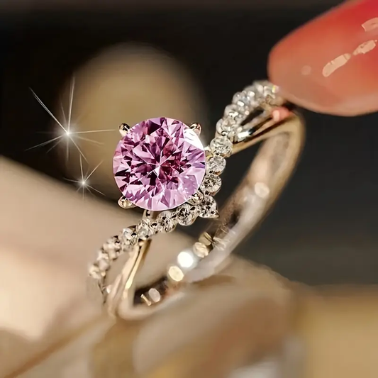 Bezaubernder Ring mit pinkem Kristall